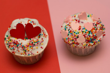 cupcakes  with pink hearts  and red hearts on a red and pink background
