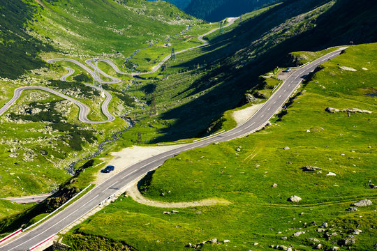 Transfagarasan mountain road in the valley, view from above. beautiful transportation scenery in summertime