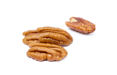 Fresh pecan nuts isolated on a white background