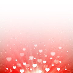 Obraz na płótnie Canvas Heart bokeh on red shiny background