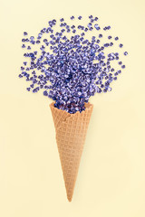 Ice cream cone with glitters. Minimal concept.