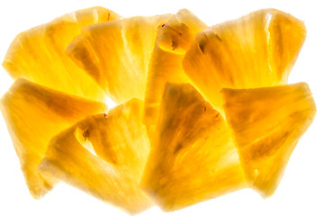 Pineapple chunks isolated on white background