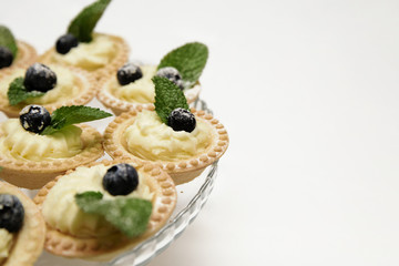dessert. Baskets with cream and fresh berries