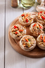 Champignon caps stuffed with minced meat