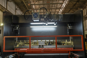 Industrial workshop or hangar on production of ventilation systems. Metalworking factory abstract background with lots of equipment and machinery