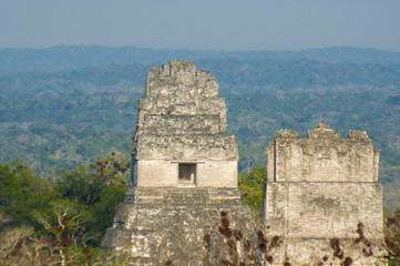 Fototapeta na wymiar Panoramic of Tikal pyramids Gran Jaguar in Peten, Guatemala. Mayan culture.