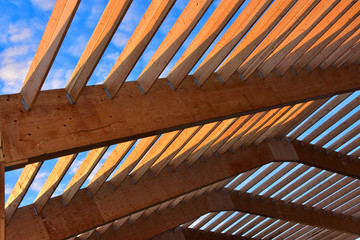 Obraz na płótnie Canvas Wood frame commercial building under construction.