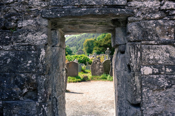 GLENDALOUGH, IRELAND - JUL 26, 2017: Glendalough was an Early Medieval monastic settlement founded in the 6th century by St Kevin.
