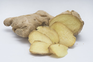 Sliced ginger on a white background