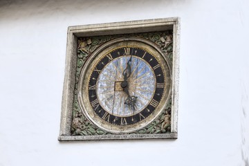 Fototapeta na wymiar Clock on the Church of the Holy Spirit, Tallinn, Estonia