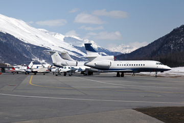 Private jets and planes in the airport of St mORITZ Switzerland