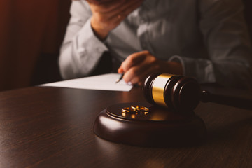 Judge gavel deciding on marriage divorce