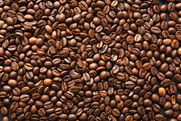 Coffee beans texture, brown background for design. Saint Valentine's Day card on fabruary 14, holiday concept.