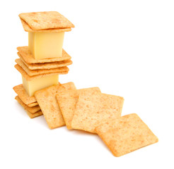 Delicious crackers with cheese on white background