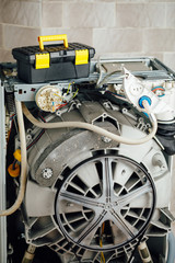 washing machine with open enclosure is ready for service