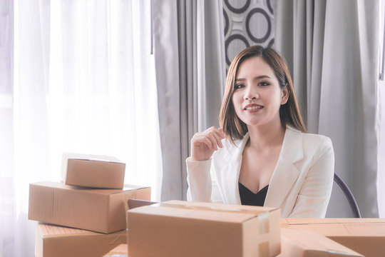Working woman is managing delivery for her online business store