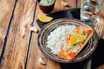 Salmon with Garlic Lemon Butter Sauce and rice