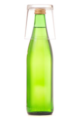 Glass bottle of soda water and glass