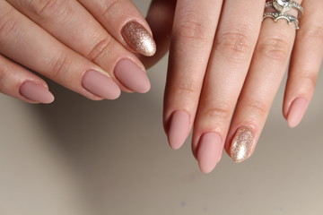 Nude manicure in pink shades