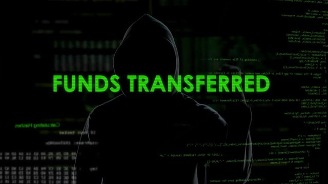 Male hacker transferring funds, money system protection, online banking error