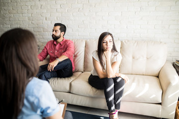 Couple with relationship difficulties at marriage counselor office