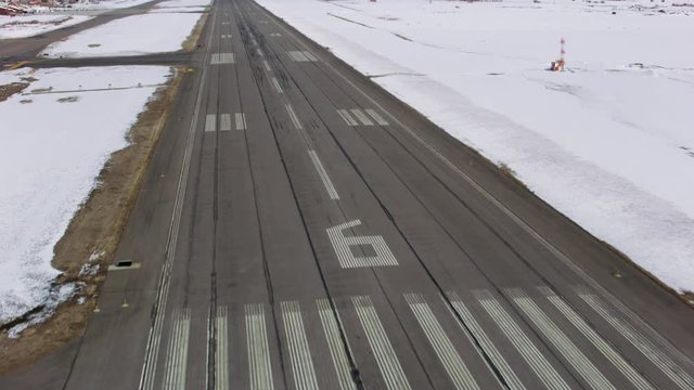 Aerial view of landing on a airport runway in winter, Colorado