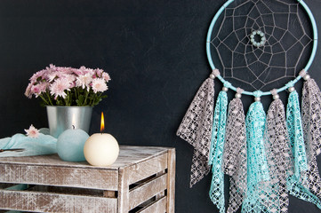 Dream catcher on black wall background