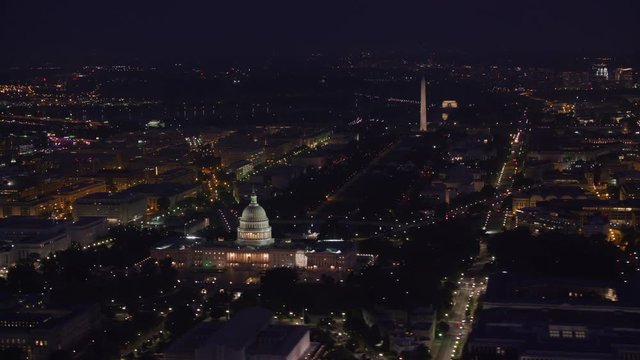 Washington, D.C. circa-2017, Aerial view of the Lincoln Memorial, Washington Monument and Capitol Building at night.  Shot with Cineflex and RED Epic-W Helium. 