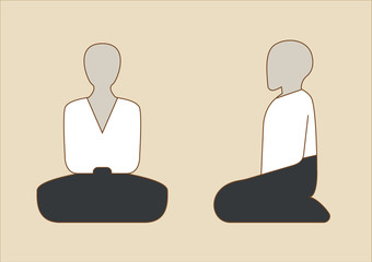 Traditional Japanese Aikido Practitioner Sitting in Meditation