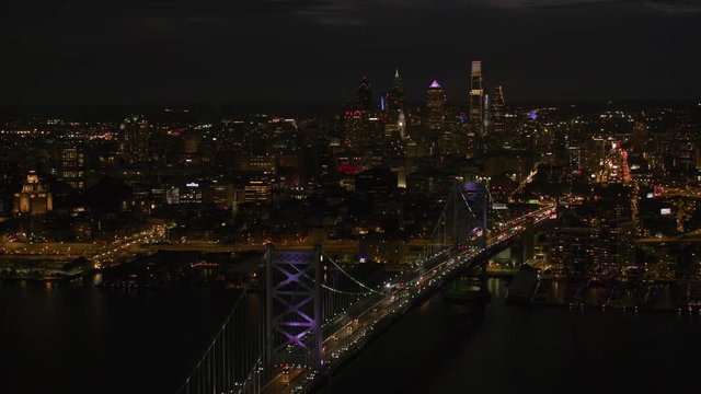 Philadelphia, Pennsylvania circa-2017, Night approach to Philadelphia over Ben Franklin bridge.  Shot with Cineflex and RED Epic-W Helium. 