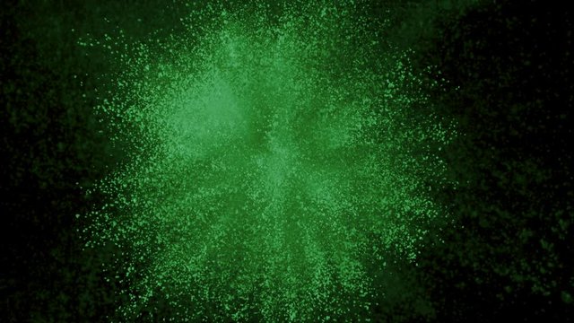 Green powder exploding on black background in super slow motion, shot with Phantom Flex 4K
