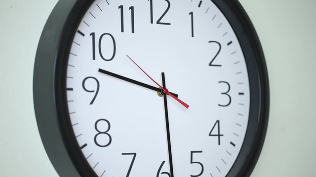 4K time lapse shot of clock moving fast in business office
