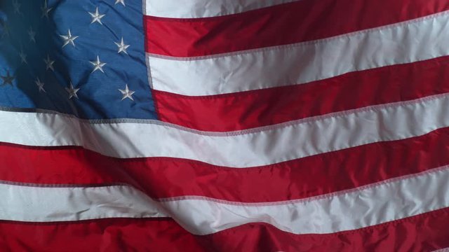 Slow motion shot of United States of America flag waving in wind