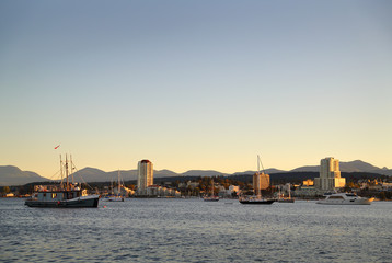 Fototapeta premium Nanaimo Harbor Dusk, British Columbia. Waterfront condominiums overlook the harbor and marina in Downtown Nanaimo, British Columbia, Canada.&nbsp;
