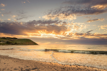 Colourful sunset at the beach with pebbles in Myponga Beach South Australia