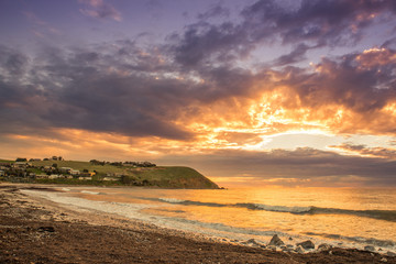 Colourful sunset at the beach with pebbles in Myponga Beach South Australia