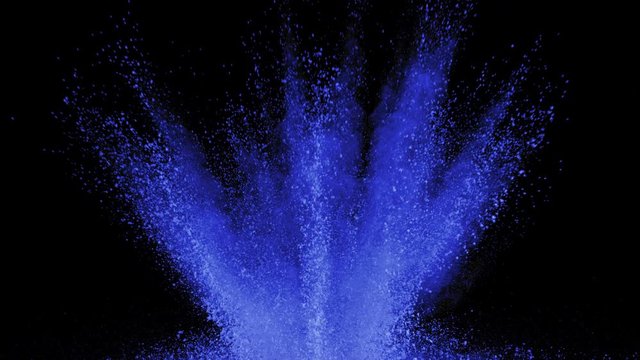 Blue powder exploding on black background in super slow motion, shot with Phantom Flex 4K