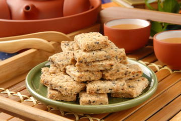 Square cookies on the green plate