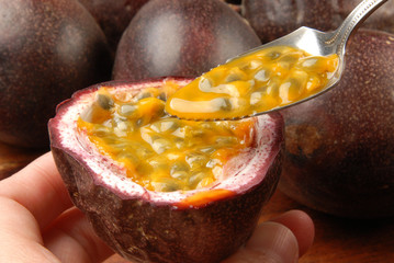 Passion fruit pulp with spoon 
