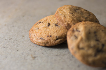 Chocolate cookies on stone table.
