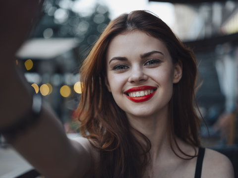 Smiling Caucasian woman posing for selfie