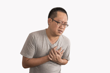Asian man having heart attack. Feel bad on chest pain.. Image on isolated background. Man wear eyeglasses and short hair style.