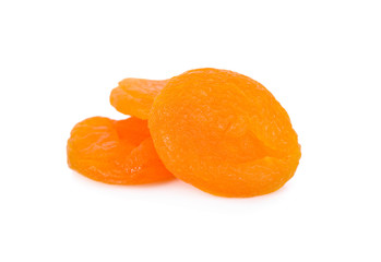 pile of dried ripe apricots on white background