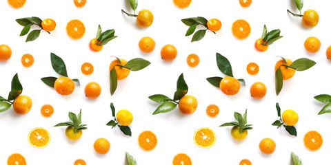 Food texture. Seamless pattern of fresh fruit tangerines isolated on white background, top view, flat lay.