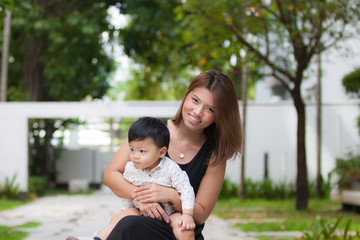 Fototapeta premium Mom and son enjoying the happy time