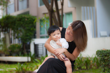 Fototapeta premium Mom and son enjoying the happy time