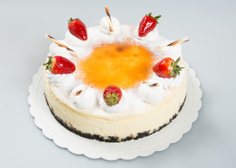 cake or cake with strawberries on a background.