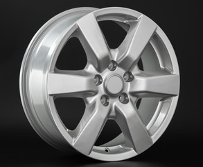 Obraz premium Aluminum metal wheel rim texture. Car alloy wheel, isolated on black background