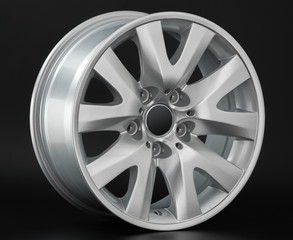 Obraz premium Aluminum metal wheel rim texture. Car alloy wheel, isolated on black background