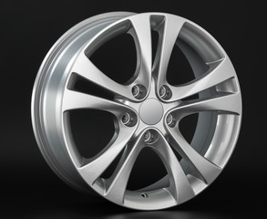 Aluminum metal wheel rim texture. Car alloy wheel, isolated on black background